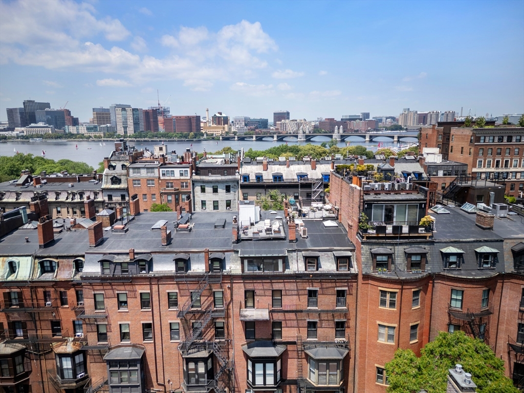 129 Beacon Street, Unit PH Boston, MA 02116 - Photo 29 of 40 a view of city with tall buildings