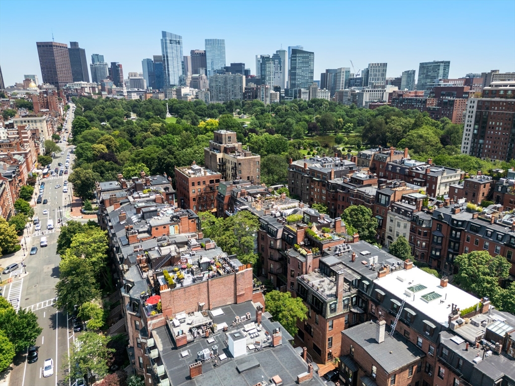 129 Beacon Street, Unit PH Boston, MA 02116 - Photo 36 of 40 a city view with tall buildings
