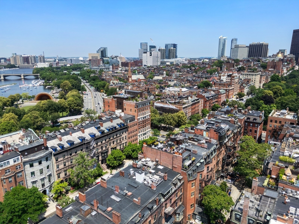 129 Beacon Street, Unit PH Boston, MA 02116 - Photo 39 of 40 a view of a city with tall buildings