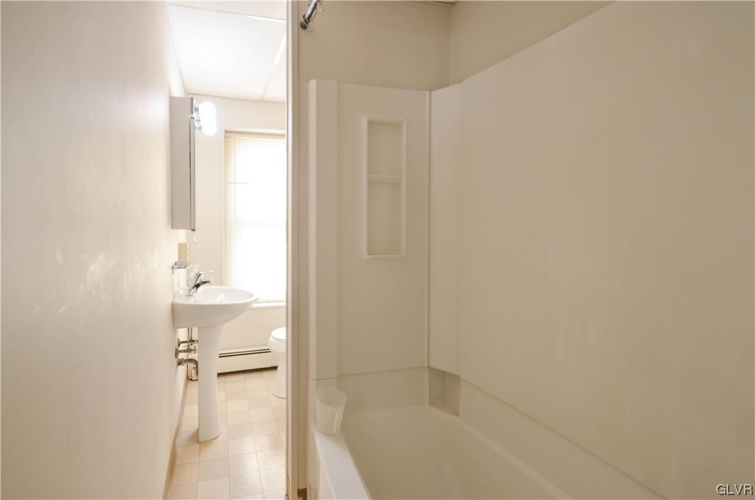 33 South 5th Street Emmaus, PA 18049 - Photo 18 of 24 a bathroom with a bathtub