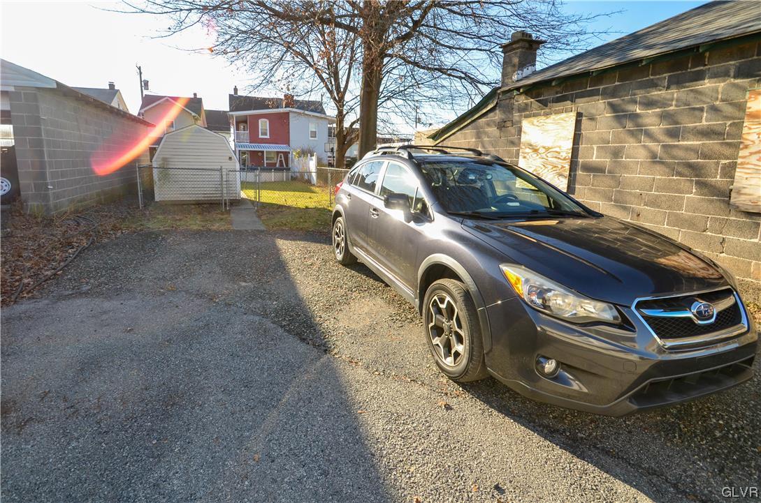 33 South 5th Street Emmaus, PA 18049 - Photo 23 of 24 a car parked in front of a house
