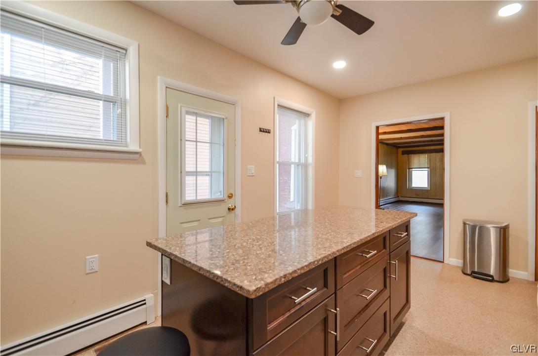 33 South 5th Street Emmaus, PA 18049 - Photo 4 of 24 a kitchen with a sink a counter space and a window