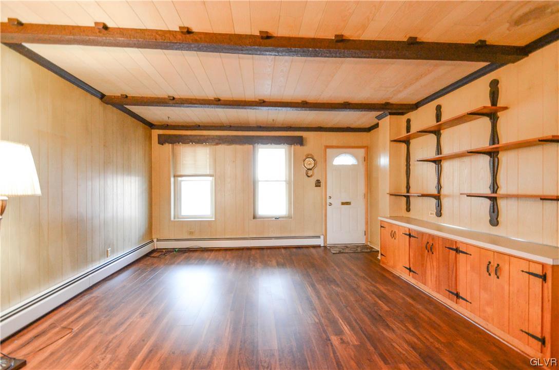 33 South 5th Street Emmaus, PA 18049 - Photo 7 of 24 a view of an empty room with wooden floor and a window