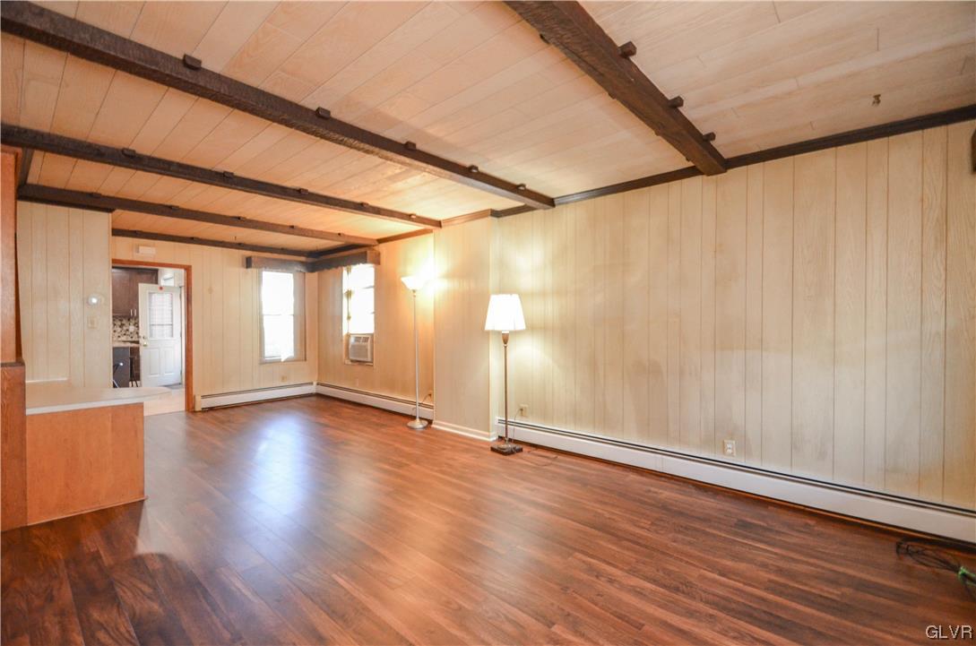 33 South 5th Street Emmaus, PA 18049 - Photo 9 of 24 a view of an empty room with wooden floor and a window