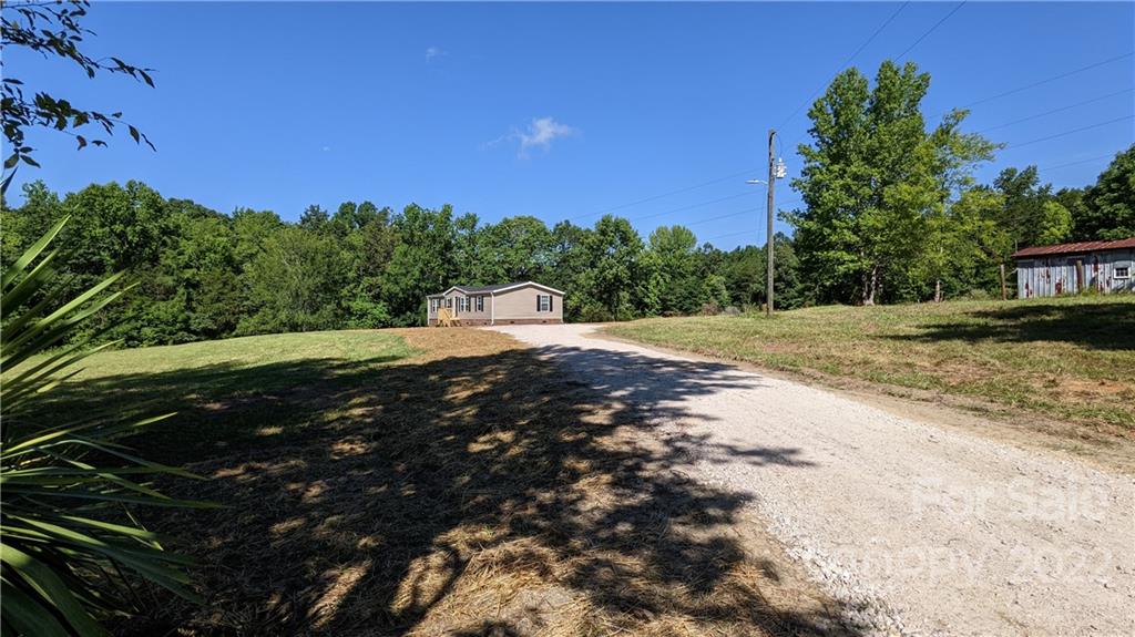 422 Pamela Road York, SC 29745 - Photo 36 of 38 a view of a road with a yard