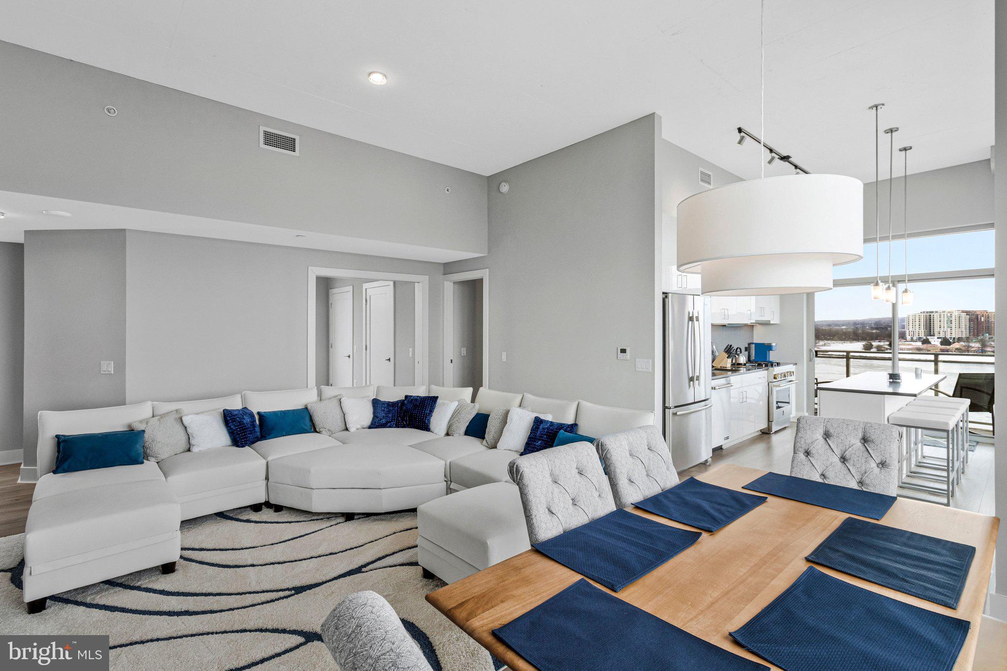 88 V Street Southwest, Unit 801 Washington, DC 20024 - Photo 11 of 58 a living room with furniture and wooden floor