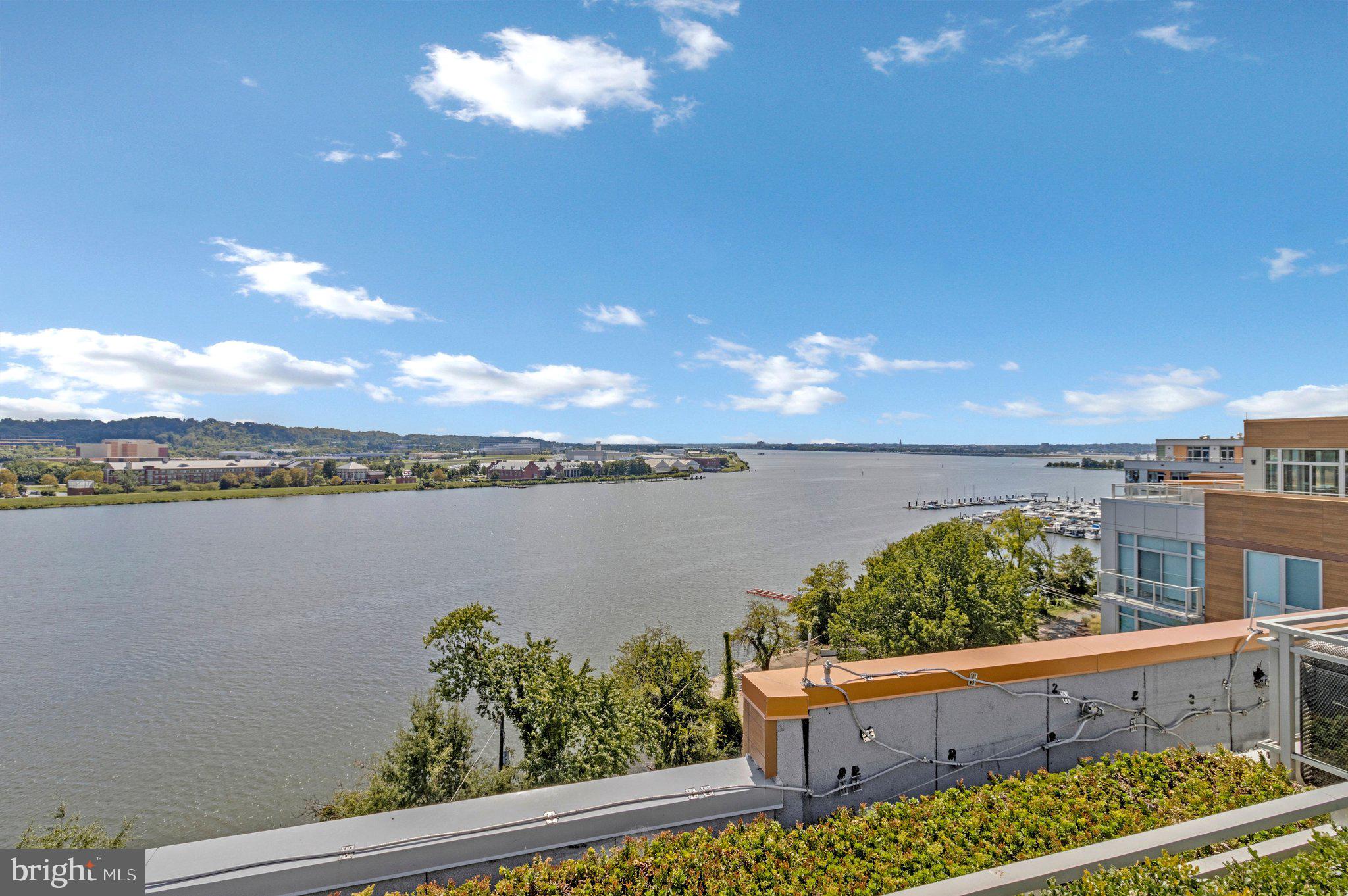 88 V Street Southwest, Unit 801 Washington, DC 20024 - Photo 43 of 58 a view of a lake from a balcony
