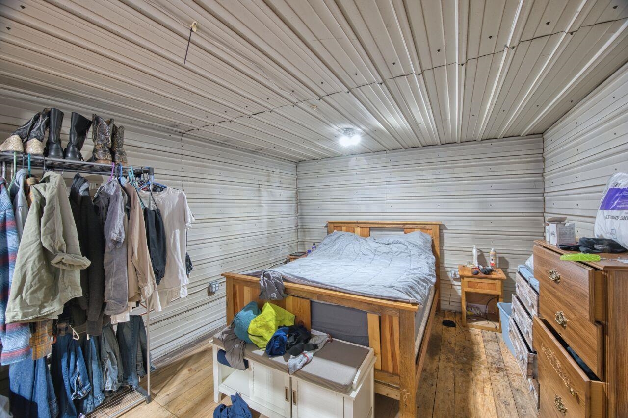 112 Highway 71 Big Falls, MN 56627 - Photo 13 of 35 Bedroom with a sauna / steam room and hardwood / wood-style floors