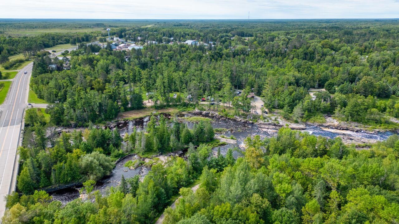 112 Highway 71 Big Falls, MN 56627 - Photo 34 of 35 Aerial view of property and surrounding area featuring a forest