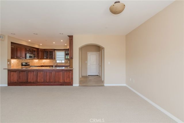 a bathroom with a sink double vanity and a mirror