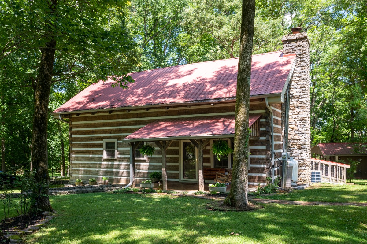 a view of a chair and table of the house