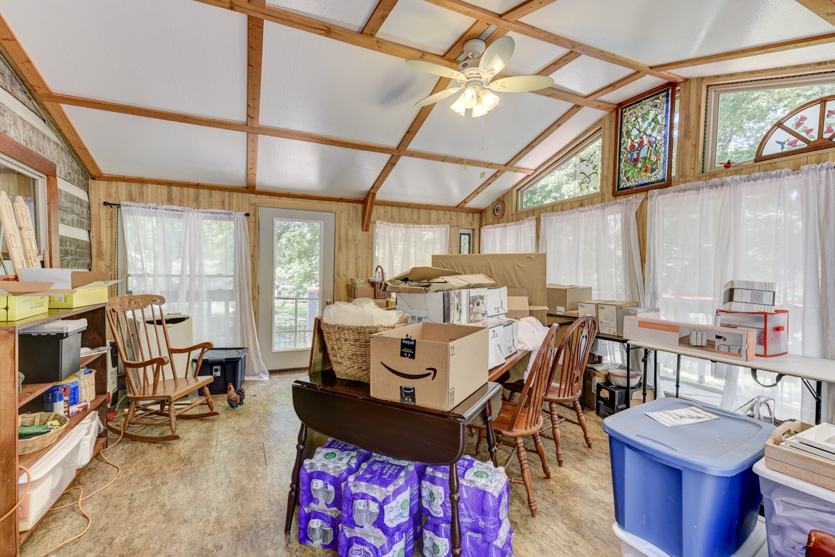 2344 Granny Wright Lane Hermitage, TN 37076 - Photo 12 of 37 a living room with furniture a flat screen tv and next to a window