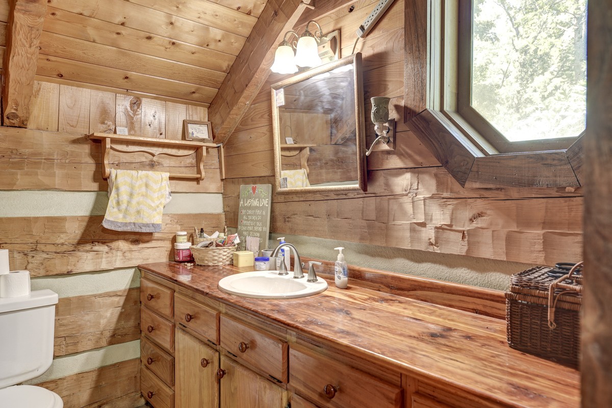 2344 Granny Wright Lane Hermitage, TN 37076 - Photo 16 of 37 a bathroom with a sink and a mirror