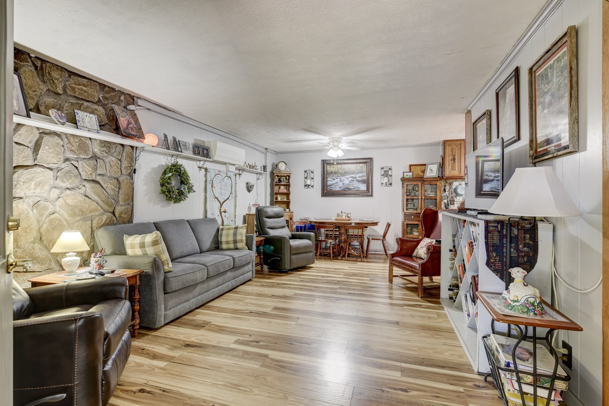 2344 Granny Wright Lane Hermitage, TN 37076 - Photo 17 of 37 a living room with furniture and a fireplace