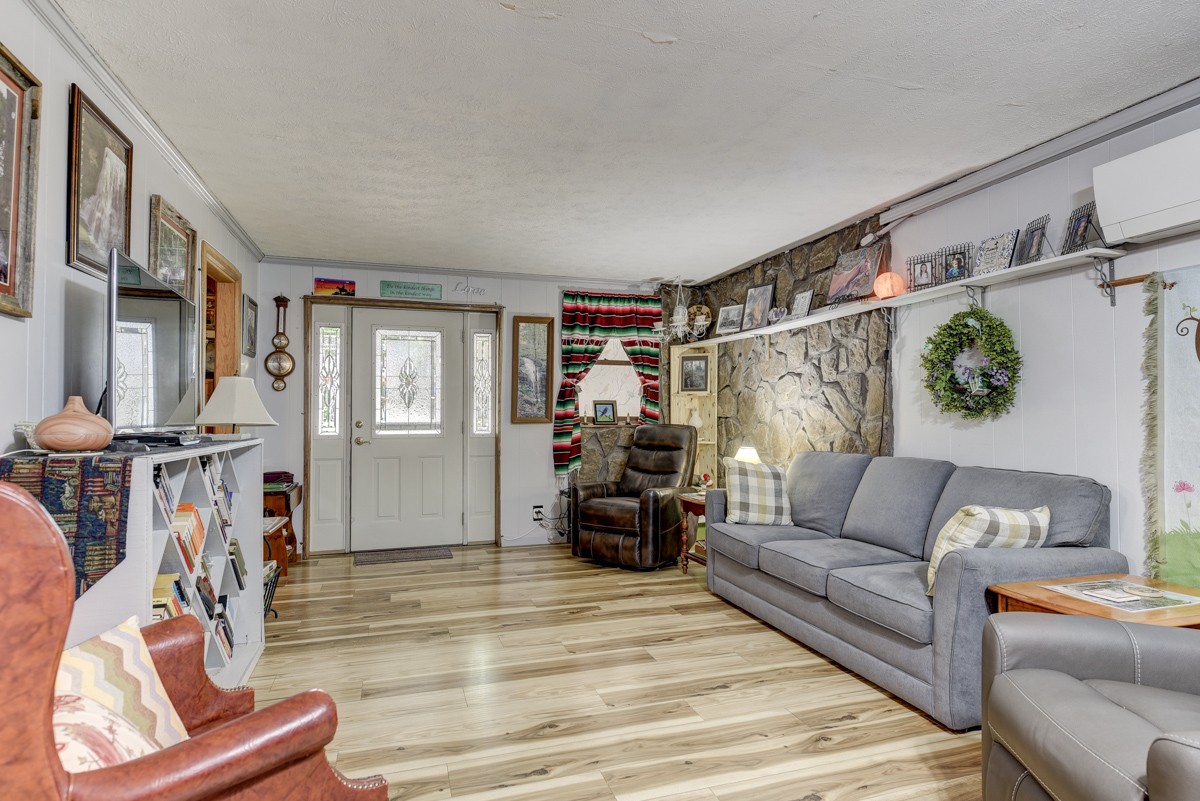 2344 Granny Wright Lane Hermitage, TN 37076 - Photo 18 of 37 a living room with furniture or couch and a flat screen tv