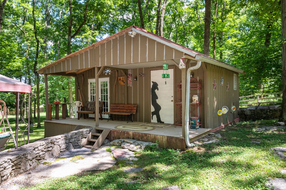 2344 Granny Wright Lane Hermitage, TN 37076 - Photo 28 of 37 a front view of a house with garden