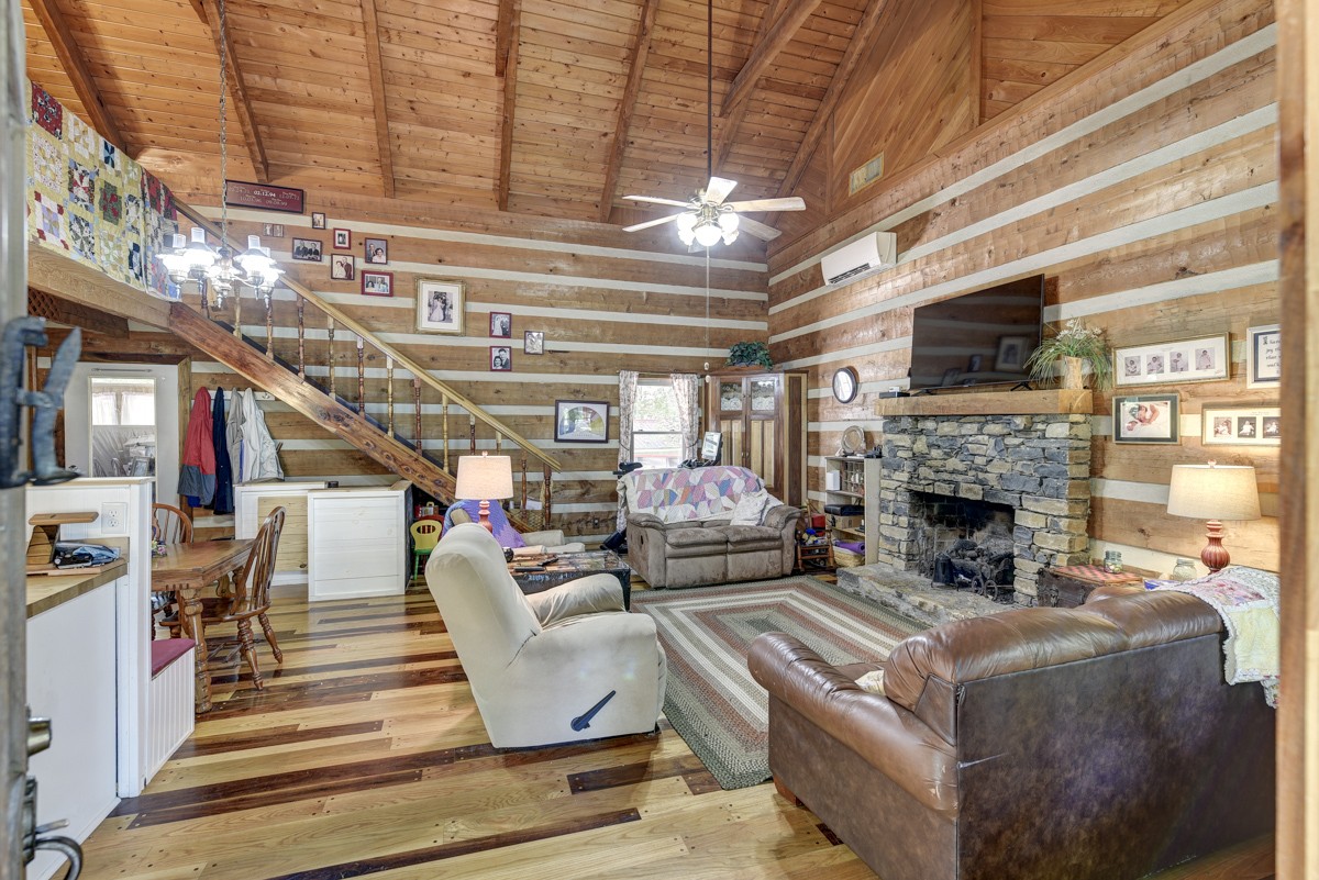 2344 Granny Wright Lane Hermitage, TN 37076 - Photo 6 of 37 a living room with furniture and a fireplace