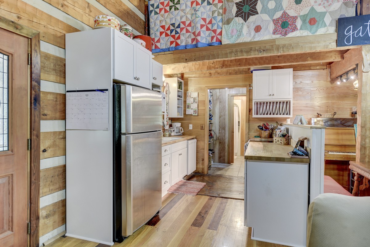2344 Granny Wright Lane Hermitage, TN 37076 - Photo 8 of 37 a kitchen with stainless steel appliances granite countertop a refrigerator and a stove