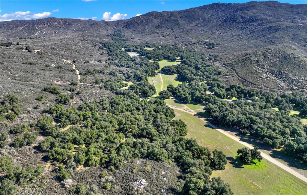 36000 Tenaja Truck Trail Fallbrook, CA 92028 - Photo 18 of 28 a view of a lake with mountains in the background