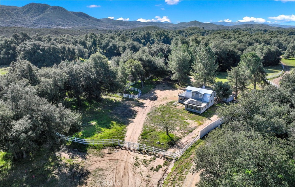 36000 Tenaja Truck Trail Fallbrook, CA 92028 - Photo 2 of 28 a view of a lake with mountains in the background