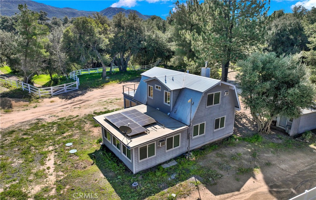 36000 Tenaja Truck Trail Fallbrook, CA 92028 - Photo 5 of 28 front view of a house with a yard