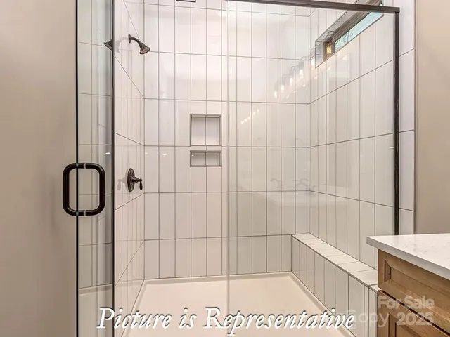 a view of a room that has a window in it