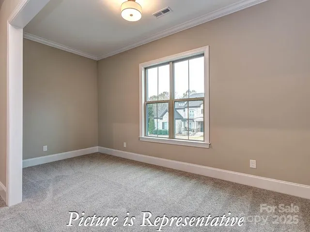 a view of a balcony with wooden floor