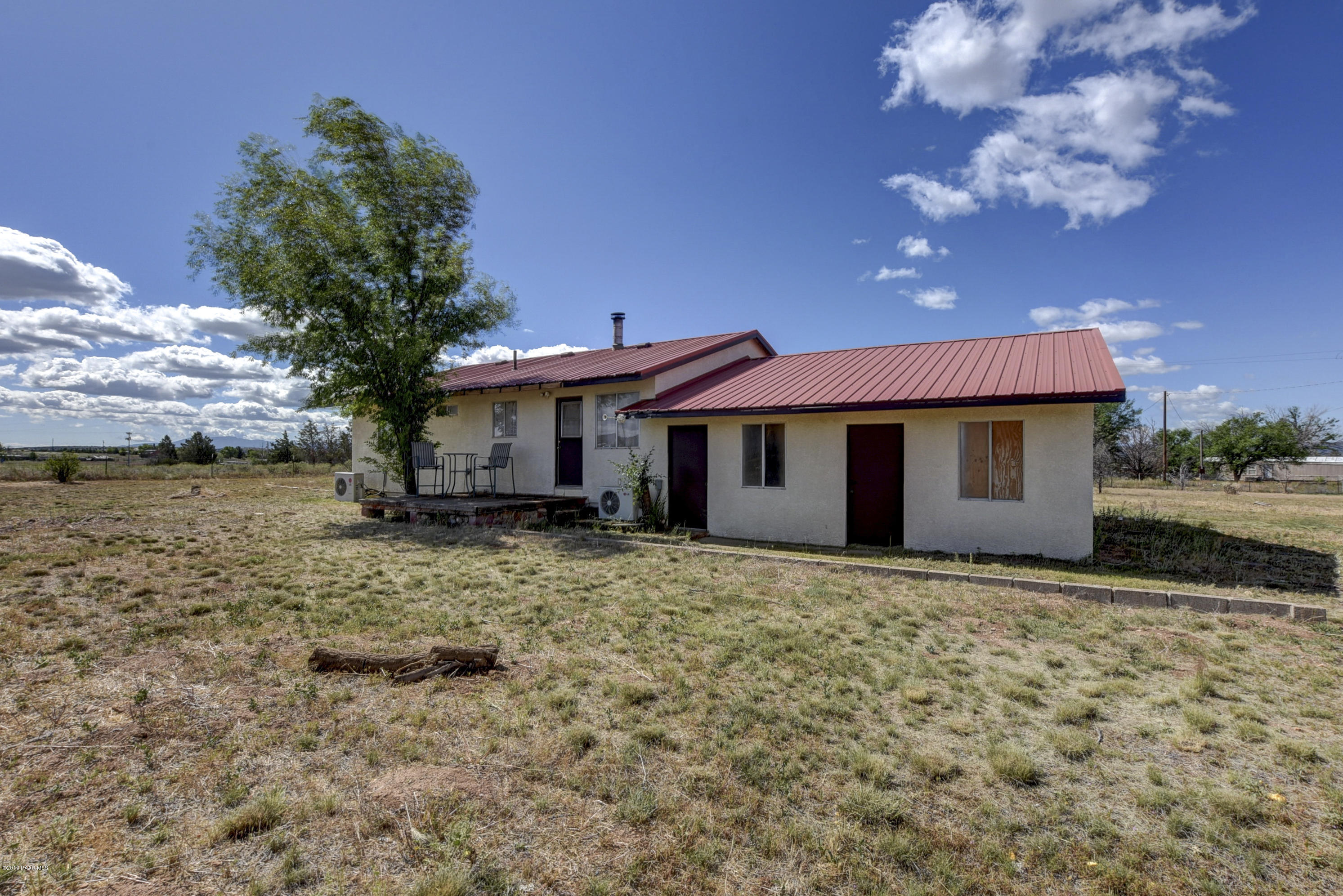 700 West Antelope Run Road Paulden, AZ 86334 - Photo 3 of 24 a front view of a house with garden