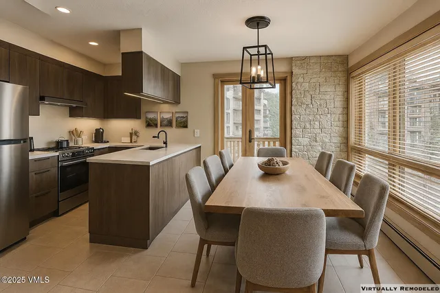a kitchen with stainless steel appliances a microwave a stove and cabinets