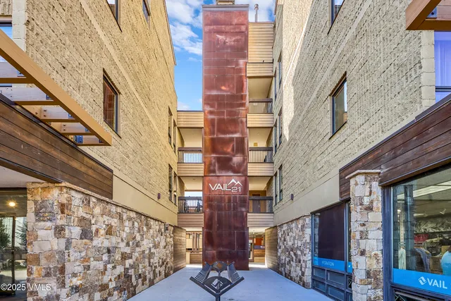 a view of a brick building with an outdoor space