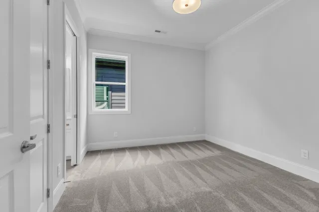 a view of a livingroom with a ceiling fan