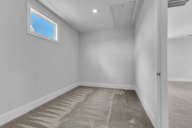 a bathroom with a bath tub with a shower