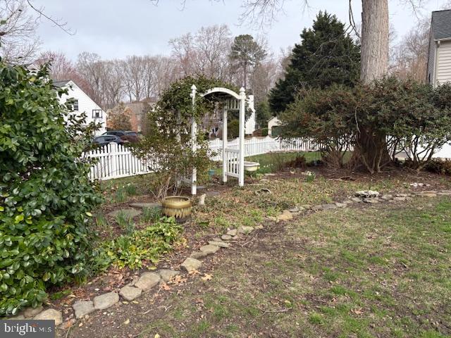 400 Willards Way Yorktown, VA 23693 - Photo 7 of 8 a front view of a house with a yard