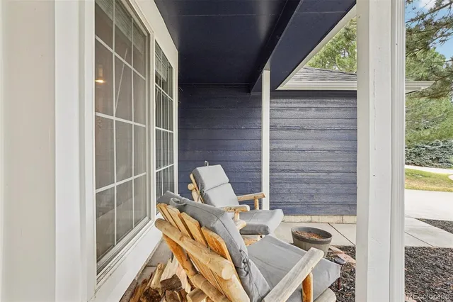 a view of balcony with wooden floor