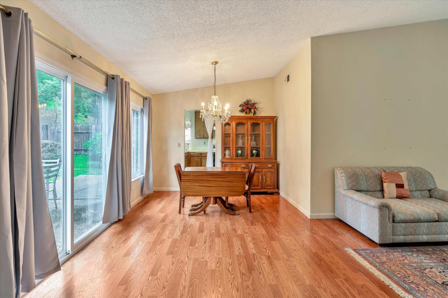 188 Masonic Drive Vallejo, CA 94591 - Photo 12 of 28 a living room with furniture and a wooden floor
