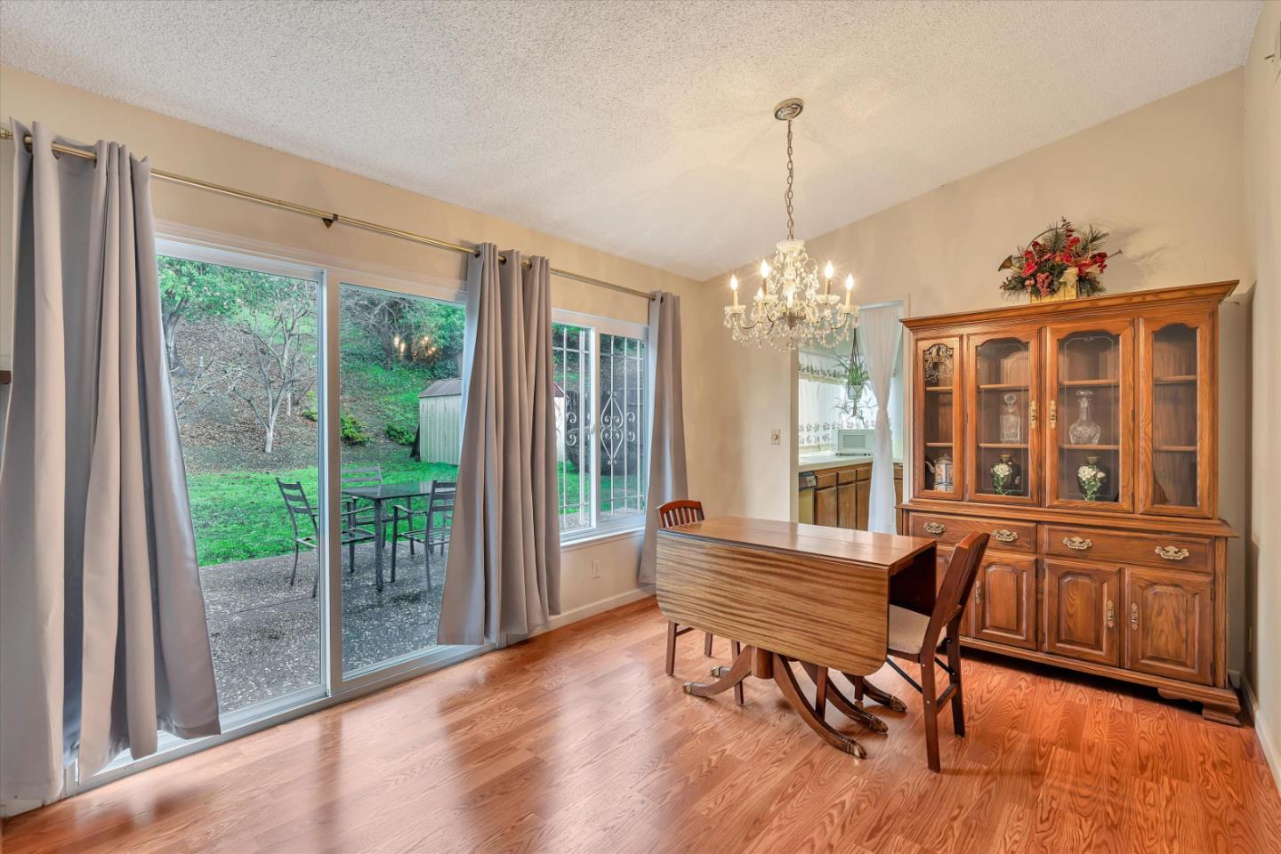 188 Masonic Drive Vallejo, CA 94591 - Photo 13 of 28 a view of a livingroom with furniture wooden floor and a chandelier