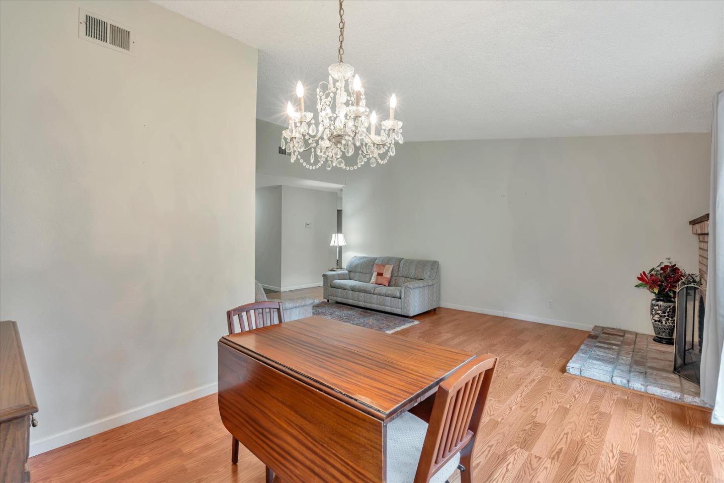 188 Masonic Drive Vallejo, CA 94591 - Photo 14 of 28 a room with chandelier and table