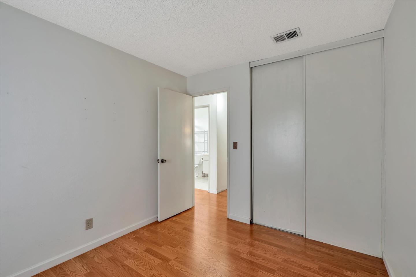 188 Masonic Drive Vallejo, CA 94591 - Photo 16 of 28 a view of an empty room with wooden floor