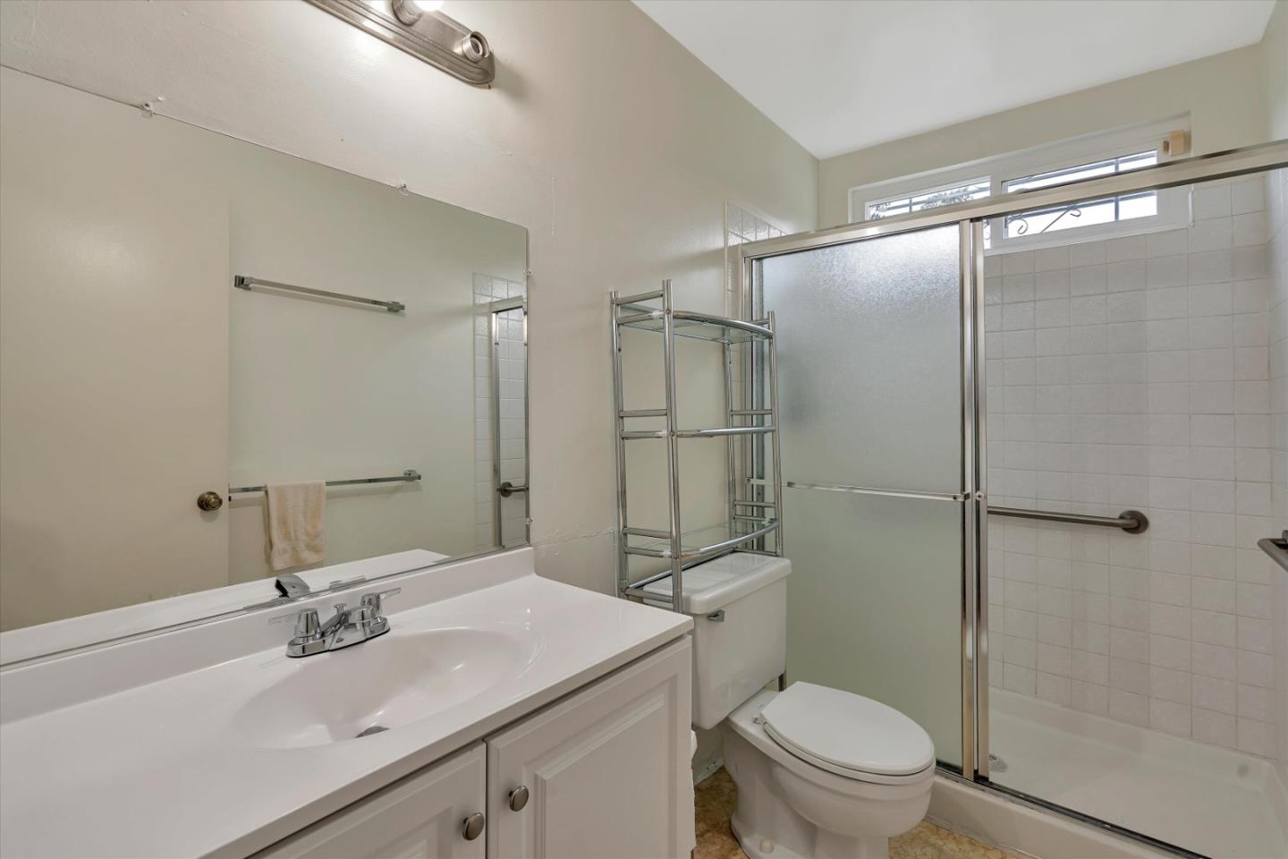 188 Masonic Drive Vallejo, CA 94591 - Photo 21 of 28 a bathroom with a sink toilet vanity and shower