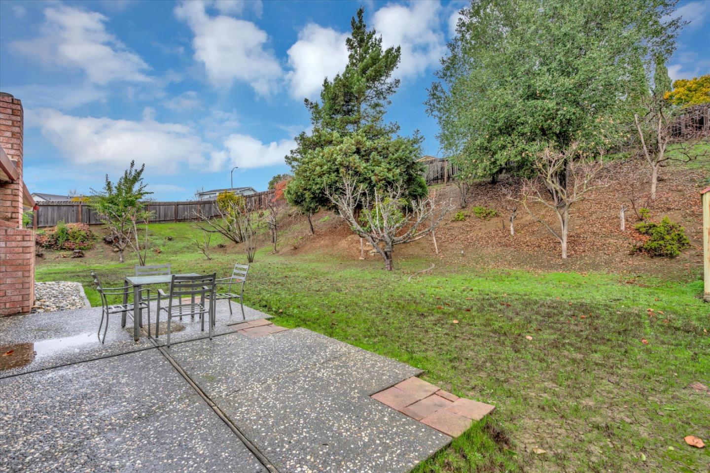 188 Masonic Drive Vallejo, CA 94591 - Photo 23 of 28 a view of a garden with a bench