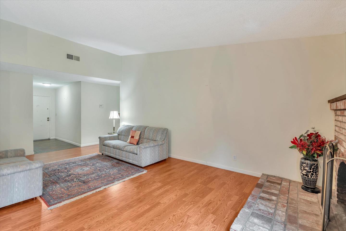 188 Masonic Drive Vallejo, CA 94591 - Photo 6 of 28 a living room with furniture and flowers