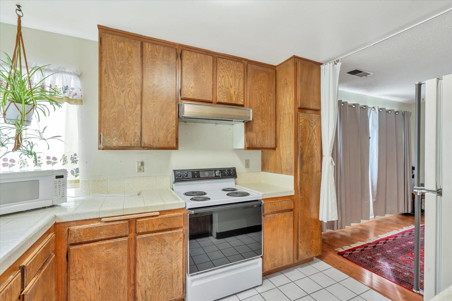 188 Masonic Drive Vallejo, CA 94591 - Photo 8 of 28 a kitchen with stainless steel appliances granite countertop a refrigerator and a sink