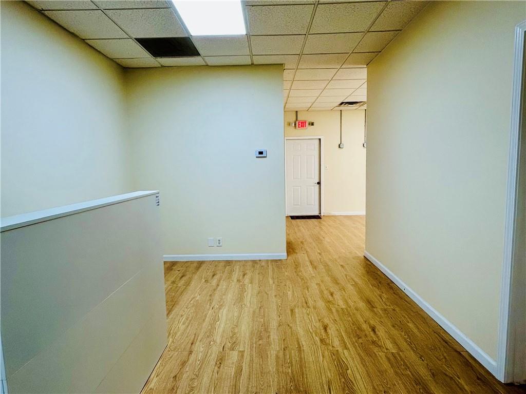 3982 Cherokee Trail Suwanee, GA 30024 - Photo 5 of 11 a view of empty room with wooden floor