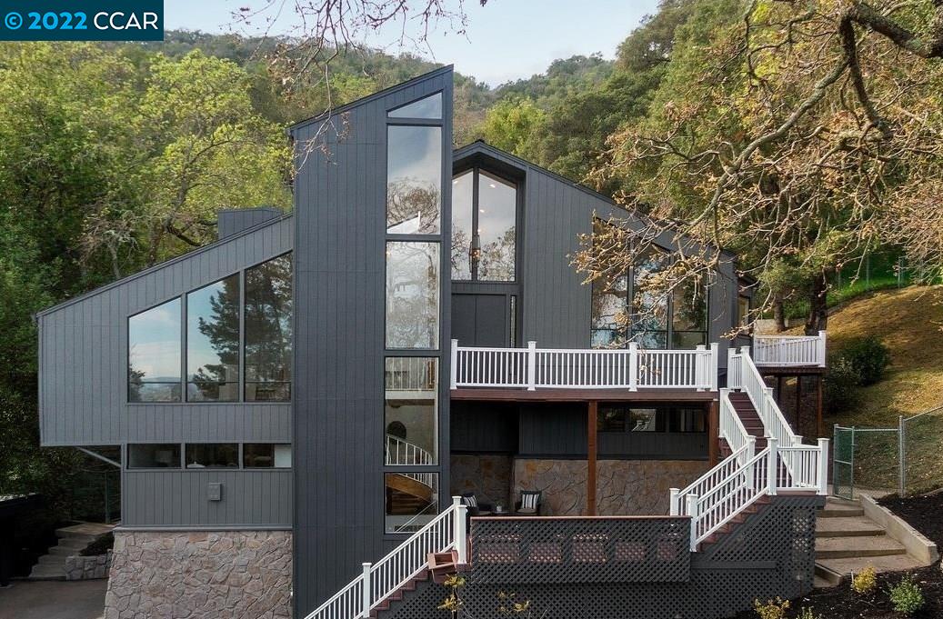 9188 Longview Drive Pleasanton, CA 94588 - Photo 1 of 1 a view of roof deck with couches and wooden fence