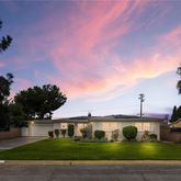 a view of street with tall buildings