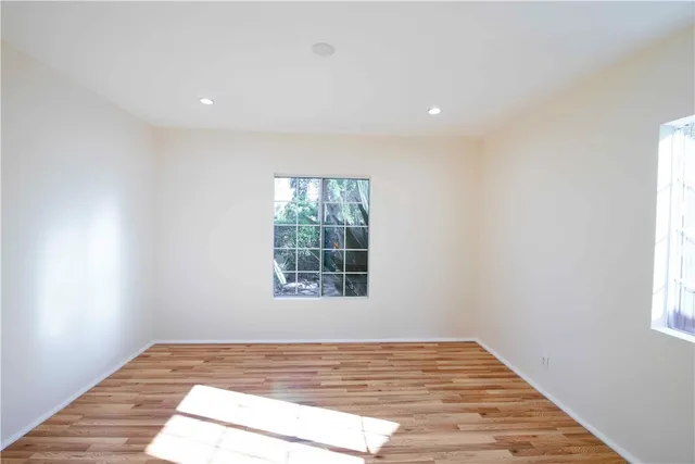 a view of an empty room and window