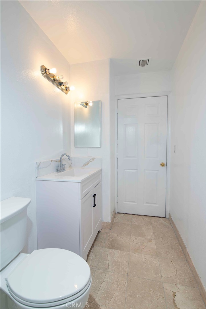 6417 White Oak Avenue Reseda, CA 91335 - Photo 33 of 50 a bathroom with a sink a toilet and shower