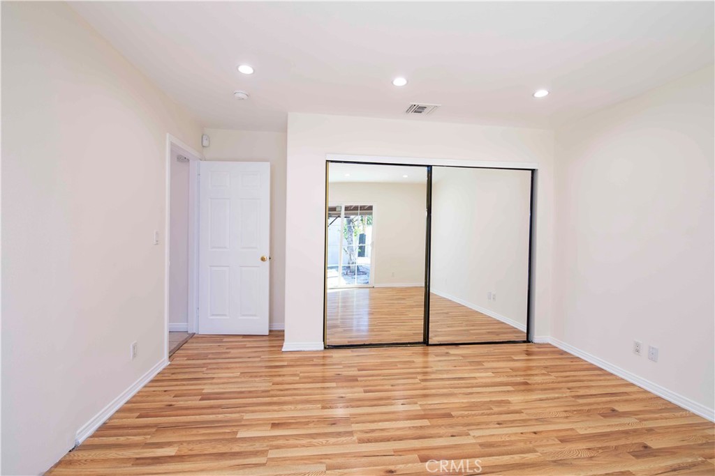 6417 White Oak Avenue Reseda, CA 91335 - Photo 35 of 50 a view of empty room with wooden floor