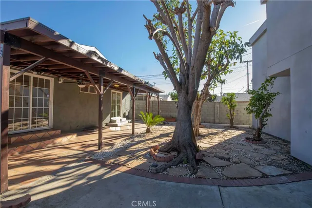 a house with trees in front of it