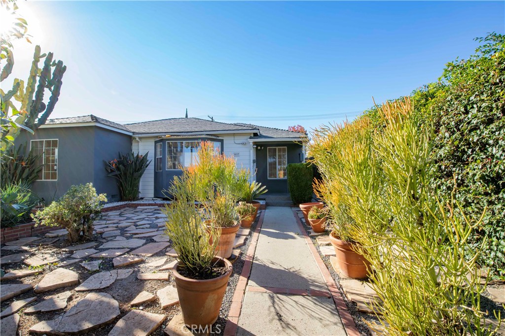 6417 White Oak Avenue Reseda, CA 91335 - Photo 45 of 50 a front view of a house with a yard